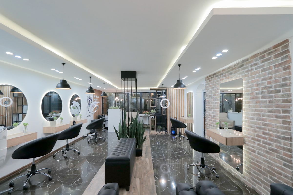 A modern salon interior with styling chairs and mirrors
